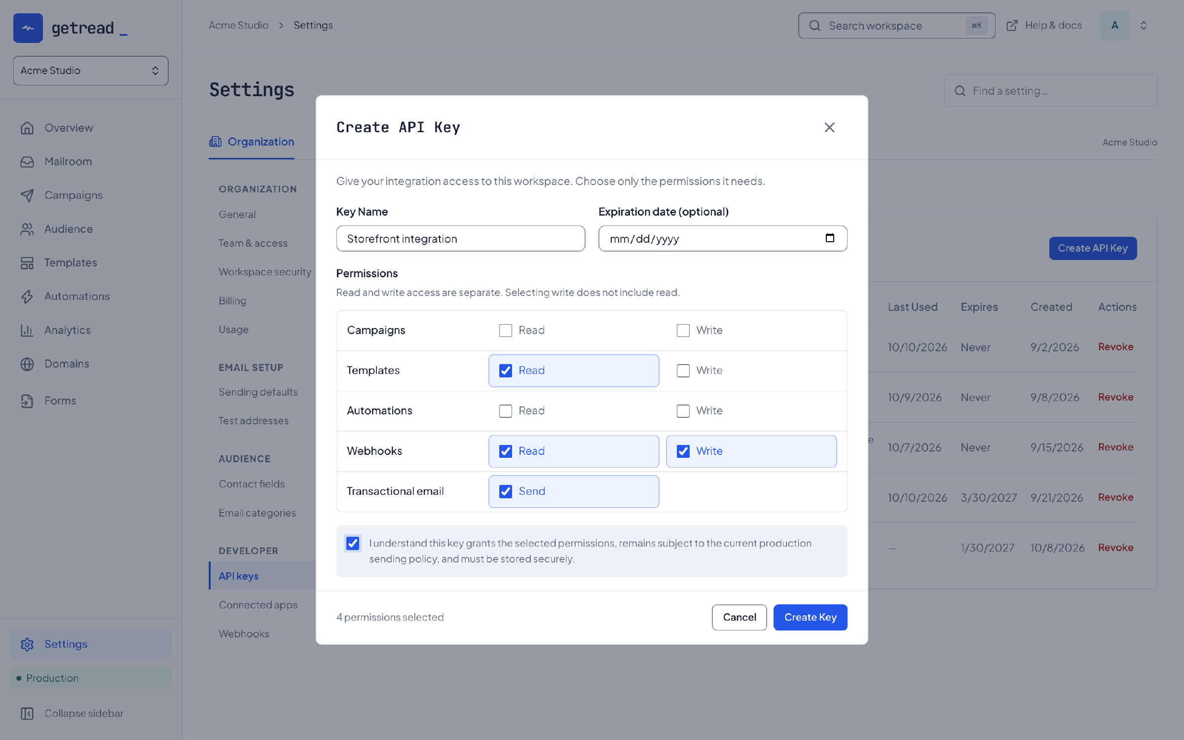 The Create API Key dialog for a key named Storefront integration, with separate read and write checkboxes for campaigns, templates, automations and webhooks plus a transactional send permission. Four permissions are selected.